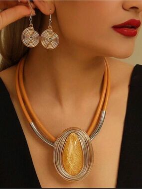 Golden Amber Spiral Pendant Necklace in Tan and matching earrings